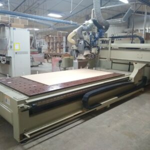 2000 Anderson Stratos SUP CNC Router showing the complete 5' × 10' vacuum table, Fanuc 0M-C control, and overall machine condition.