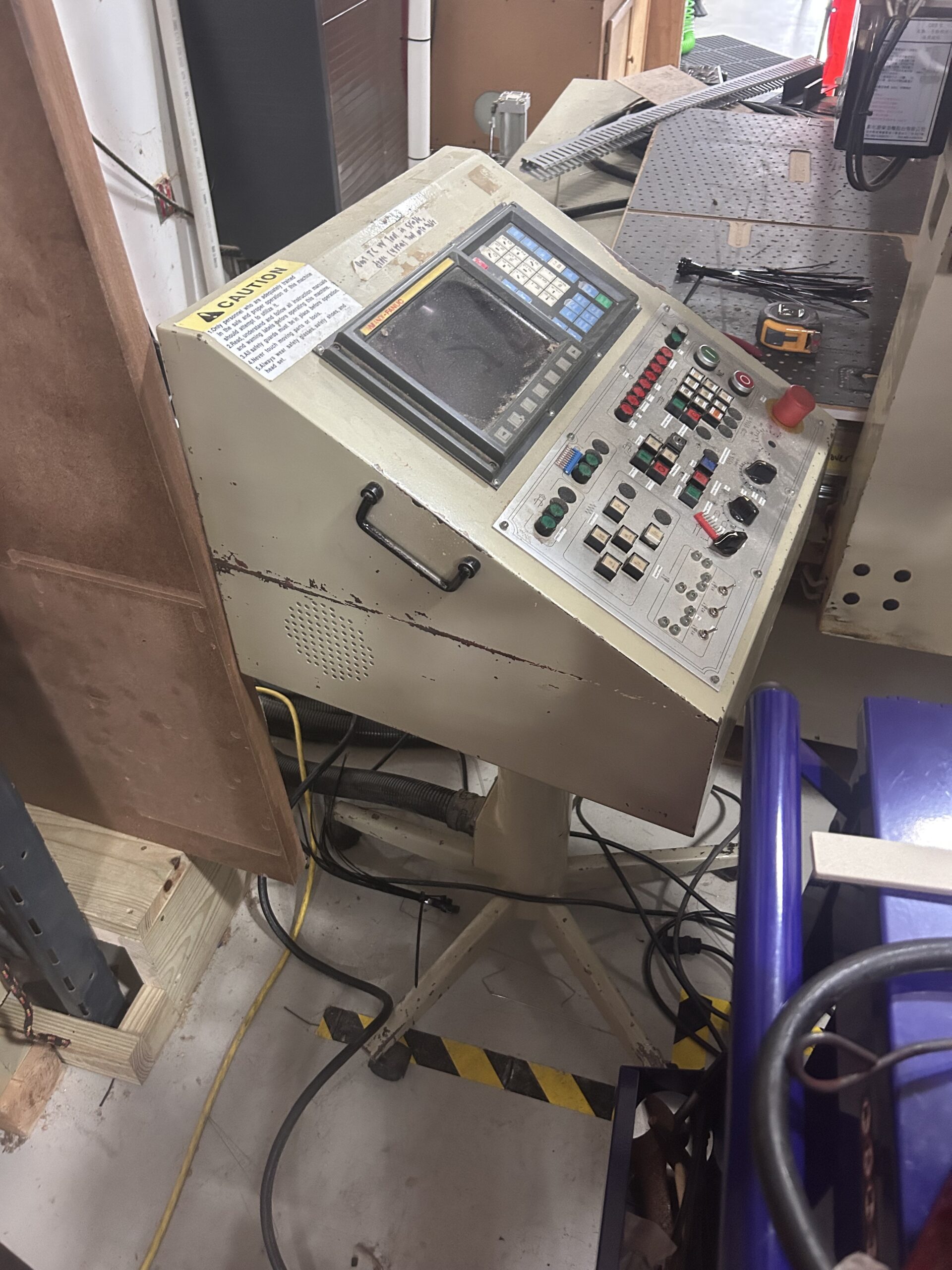 Fanuc 0M-C CNC Control Mobile stand Fanuc O Controller on a roller console.